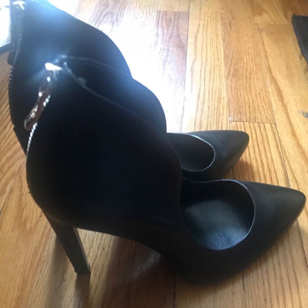 Brand new heels with back zipper details